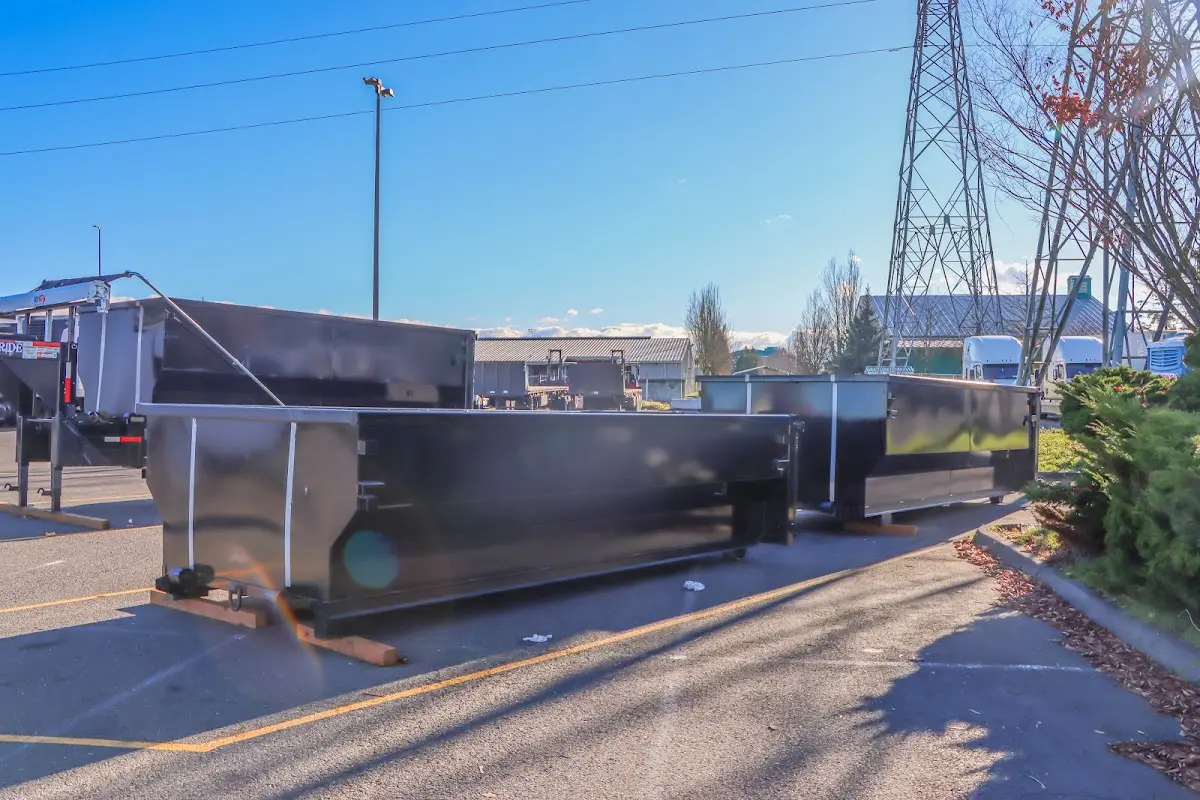 Roll-off dumpster ready for waste disposal at job site for 3 Yard Dumpster Rental in Duluth